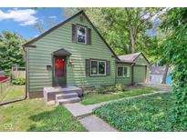 Charming home with a traditional design, featuring a well-maintained lawn and classic architectural details at 4708 Haverford Ave, Indianapolis, IN 46205