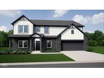 Two-story home with a brick and siding exterior and a two-car garage at 4882 Morning Valley Ct, McCordsville, IN 46055