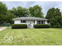 Charming single-story home featuring a well-maintained lawn and classic curb appeal at 618 W Mckenzie Rd, Greenfield, IN 46140