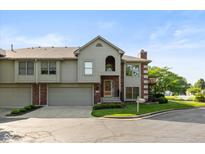 Charming townhome features a well-manicured lawn and attached two-car garage, in a cul-de-sac at 8955 Stonegate Rd # A, Indianapolis, IN 46227