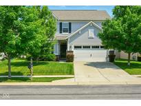 Charming two-story home with a well-maintained lawn and attached two car garage at 10606 Glenwyck Pl, Noblesville, IN 46060