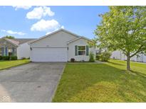 Charming single-story home featuring a well-maintained lawn and an attached two-car garage at 3423 Summer Breeze Cir, Indianapolis, IN 46239