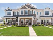 Inviting townhomes with stone accents, manicured lawns, and welcoming front porches, perfect for suburban living at 3643 Thomas Jefferson St, Westfield, IN 46074
