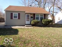 Charming single-story home with a well-maintained lawn and inviting curb appeal at 2250 N Goodlet Ave, Indianapolis, IN 46222