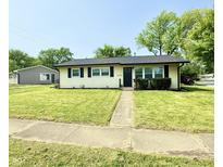 Charming single-story home featuring well-maintained lawn and classic curb appeal at 3103 Keswick Rd, Indianapolis, IN 46222