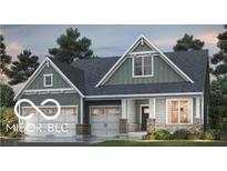 Charming home featuring a two-car garage, green siding, and appealing architectural details for a welcoming curb appeal at 6367 Stone Side Dr, Plainfield, IN 46168