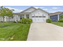 Charming single-story home featuring a well-manicured lawn and a two-car garage with white exterior at 820 Elise Dr, Westfield, IN 46074