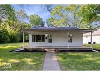 Charming single-story home with inviting front porch and well-maintained landscaping at 1993 Mulberry St, Noblesville, IN 46060