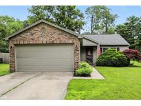 Charming single-story home with a brick facade and well-maintained landscaping at 19433 Tradewinds Dr, Noblesville, IN 46062