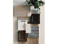 Elegant material selections featuring neutral tones and textures for a modern aesthetic at 443 Flora Pl, Carmel, IN 46290