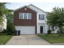 Charming two-story home with a brick facade and attached two-car garage at 847 Sylvan St, Whiteland, IN 46184