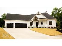 Charming home featuring a black roof, white siding, and a spacious three-car garage at 10101 - Lot 2 N Alford Rd, Fortville, IN 46040