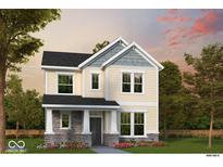 Charming two-story home featuring a stone-accented porch, neutral siding, and well-manicured landscaping at 12204 Vera Ct, Noblesville, IN 46060