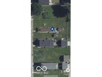 Aerial view of the property showing the home and surrounding yard at 2021 Columbia Ave, Indianapolis, IN 46202