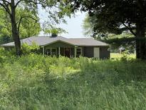 Charming single-story home featuring an unfinished front yard at 4633 S County Road 500 E, Plainfield, IN 46168
