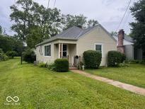 Charming single-story home featuring a well-maintained lawn and cozy front porch at 111 S Jefferson St, Brownsburg, IN 46112