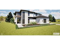 Modern two-story home with white siding, stone accents, manicured lawn, and black-framed windows at 3925 Besbie Way, Bargersville, IN 46106