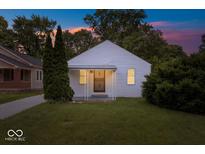 Charming home exterior with freshly cut grass, a well-kept lawn and classic design at 4310 Crittenden Ave, Indianapolis, IN 46205