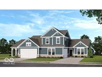 Charming two-story home with a mix of brick and siding, a two-car garage, and a well-maintained lawn at 2169 Aviary Ln, Danville, IN 46122