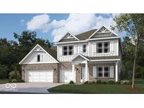 Two story home with brick and vinyl siding, attached two car garage, and gable roof at 740 Milbrodt Dr, Whiteland, IN 46184
