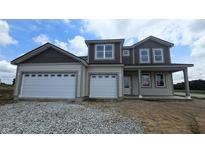 New two-story home featuring attached two-car garage and craftsman style architecture at 235 Highland Ave, Danville, IN 46122