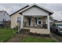 Charming bungalow featuring a cozy front porch, inviting curb appeal, and well-maintained landscaping at 2824 Brown St, Anderson, IN 46016