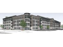 New construction, multi-story apartment building with a brick facade and classic architectural design at 925 Veterans Way # 101, Carmel, IN 46032