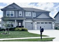 Charming two-story home featuring a brick and siding facade, well-manicured lawn, and an attached two-car garage at 4281 Viewforth Ln, Bargersville, IN 46106