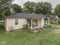 Charming single story home featuring a covered porch and quaint front yard at 1603 S Morgantown Rd, Greenwood, IN 46143