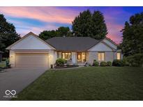 Charming ranch home with brick facade, attached garage, and beautifully maintained lawn at 770 Viewpoint Dr, Plainfield, IN 46168