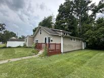 Charming single Gathering home with a cozy front porch and well-maintained lawn at 1395 Evans Ave, Noblesville, IN 46060