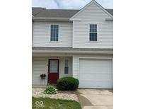 Charming townhome with a well-maintained lawn, an attached one car garage, and a red door at 459 Dekalb Dr, Westfield, IN 46074