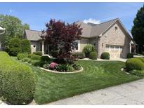 Charming brick home with manicured front yard and well-maintained landscaping at 3154 Beach Blvd, Cicero, IN 46034