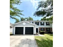 Charming two-story home featuring a two-car garage and a well-maintained lawn at 6839 Antelope Dr, Indianapolis, IN 46278