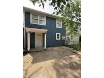 Charming two-story home with blue siding, white trim, and a welcoming front porch at 8434 Meadowlark Dr, Indianapolis, IN 46226