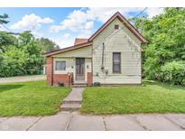 Charming home with a tidy lawn and a quaint, inviting entrance, awaiting its next chapter at 850 Duane St, Franklin, IN 46131