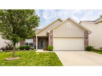 Charming single-Gathering home featuring manicured lawn, brick accents, and an attached two-car garage at 17183 Petersfield Ln, Westfield, IN 46074