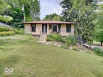 Charming single-story home features a well-maintained yard and inviting front entrance at 1908 W Northgate St, Indianapolis, IN 46228