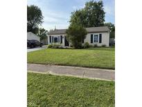 Charming home featuring a well-manicured lawn and welcoming curb appeal with a tidy landscape at 174 Jordan Dr, Franklin, IN 46131
