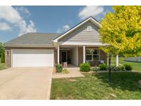 Charming single Gathering home showcasing a manicured lawn and inviting front porch at 19555 Kailey Way, Noblesville, IN 46062