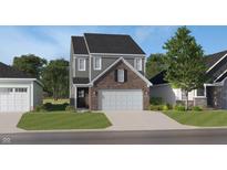 Charming two-story home with a brick-accented garage, a landscaped yard, and a welcoming entrance at 3549 Sugar Grove Dr, Whitestown, IN 46075