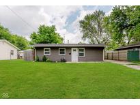 Charming single-story home with well-maintained lawn and neutral-toned exterior at 3149 Thayer St, Indianapolis, IN 46222