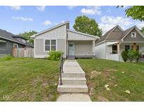 Charming single-story home with a well-manicured lawn and inviting front porch at 4129 Cornelius Ave, Indianapolis, IN 46208