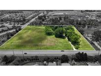 Areal shot of a large parcel of land ready for development with nearby subdivisions and pond in a desirable location at 6637 E County Road 600 S, Plainfield, IN 46168