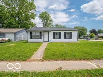 Charming single-story home with a well-maintained lawn and inviting curb appeal at 3101 Gerrard Ave, Indianapolis, IN 46224