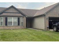 Charming one-story home with a well-maintained lawn and a two-car garage at 5954 Honeywell Dr, Indianapolis, IN 46236