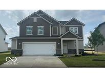 Charming two-story home featuring a two-car garage and neutral color palette at 16453 Mount Logan Rd, Noblesville, IN 46060