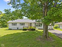 Charming single-story home with well-maintained lawn, mature trees, and inviting curb appeal at 1841 Shady Ln, Martinsville, IN 46151