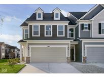 Two-story home features varied siding, dormer windows, and a two-car garage at 18811 Moray St, Westfield, IN 46074