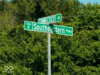 Street signs for Connecticut Ave and Southeastern Pkwy mark an intersection near the property at 18378 Southeastern Pkwy, Fortville, IN 46040